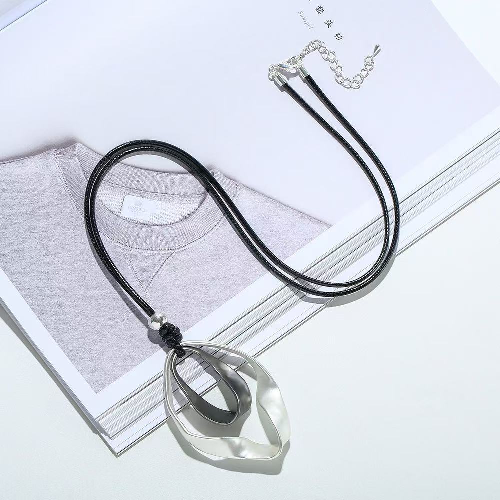 Aura Sculpted Geometric Cord Necklace