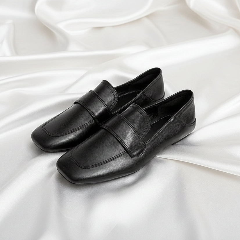 Womens black French-style retro flat shoes with a square toe and smooth faux leather finish.
