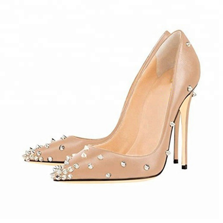 Fashionable catwalk heel high pointed toe pumps for women with studded details, super high thin heel in nude color.