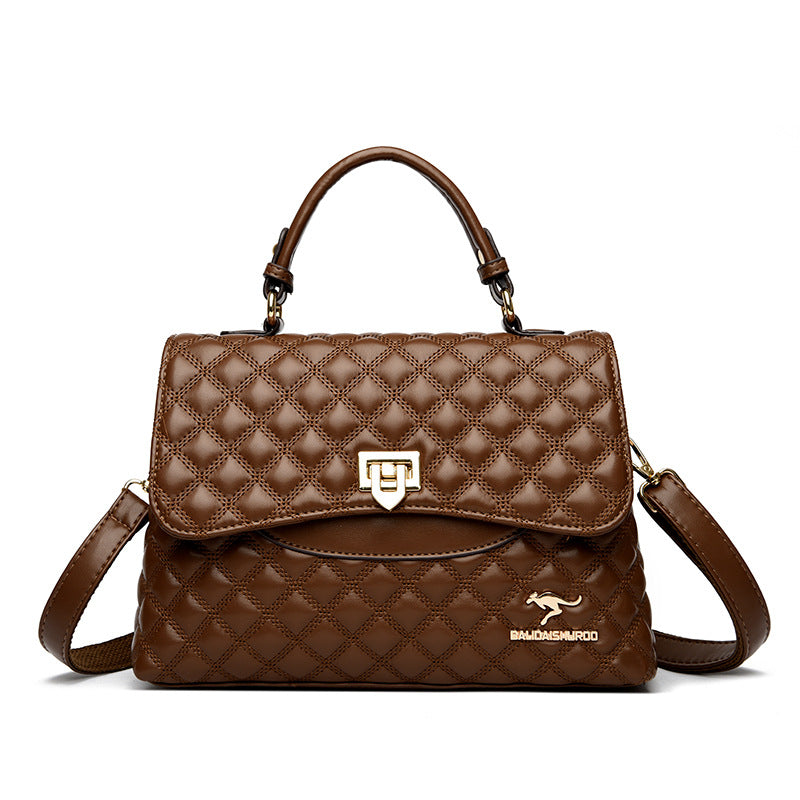 Brown quilted handbag with a visible brand logo on a white background
