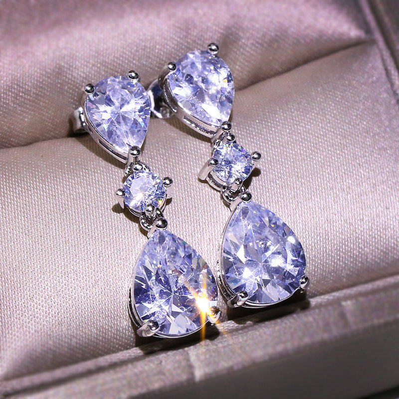 Trending Korean-style zircon teardrop earrings in 925 sterling silver for women, minimalist luxury fashion.