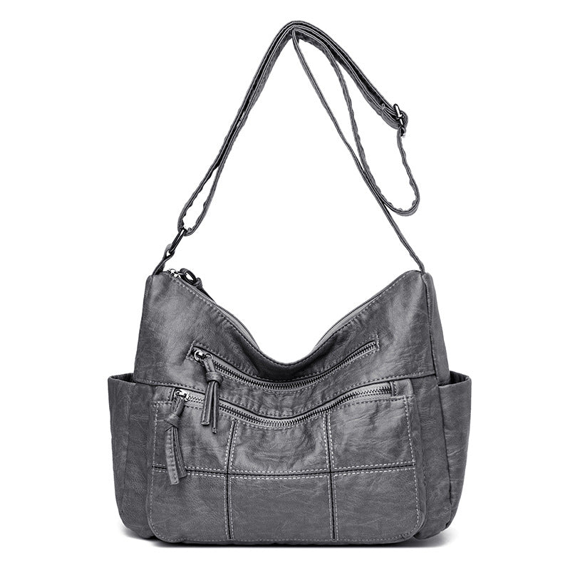 Gray: Slate Gray Season Prestige handbag in soft PU leather with 3D patch pocket and artisanal stitched seams.